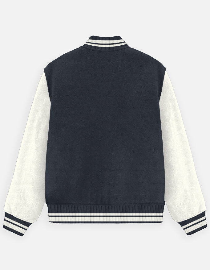 Navy blue and white varsity jacket on a light gray background